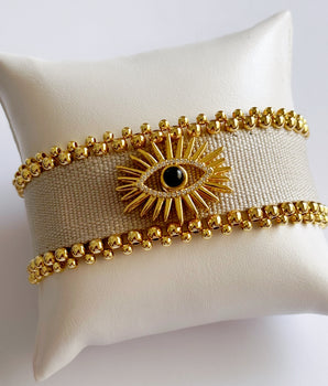 PULSERA TELA OCCHIO GRIS