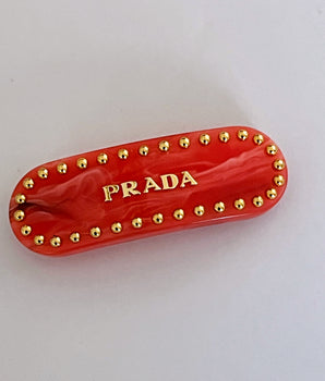 BROCHE PRADA